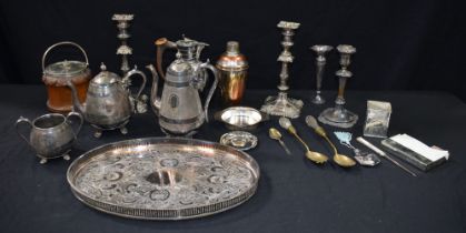 A large collection of Silver plated and other metal items, Candle sticks, Tea pots,trays etc 46 x