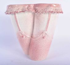 Linda Eastwood (C1992) Pottery vase, Females torso in suspenders. 20 cm x 18cm.