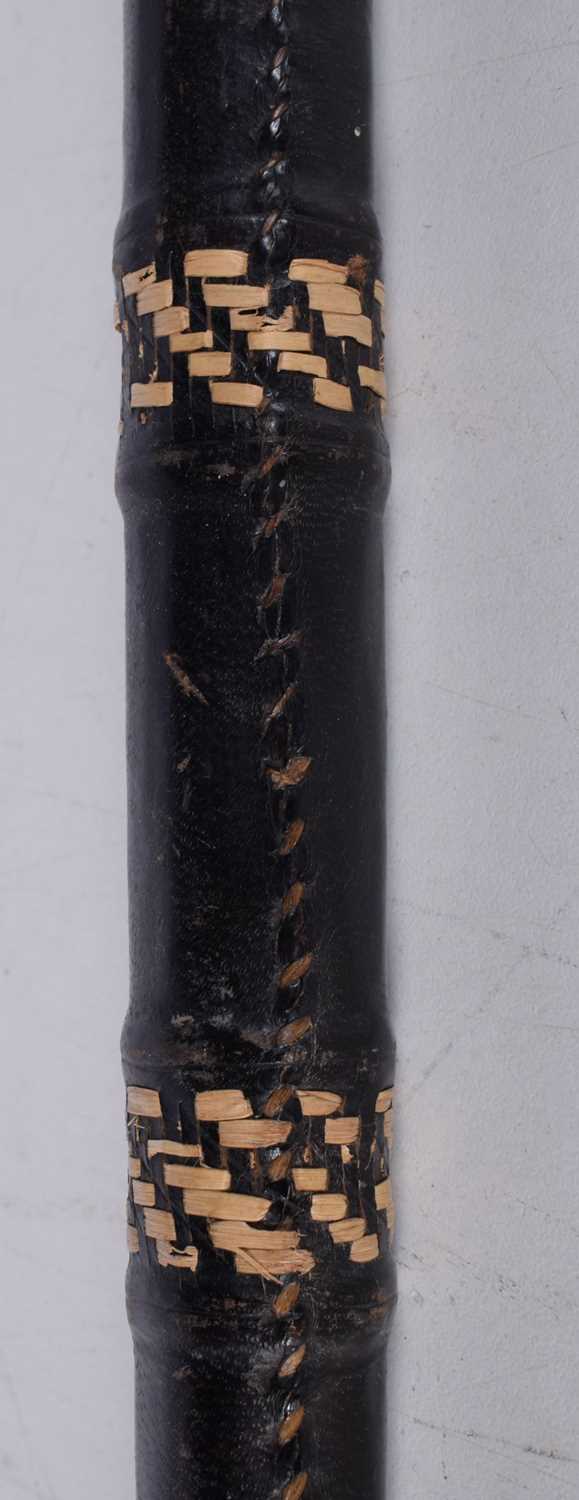 A wooden walking cane with a 9 Ct gold collar stamed 1928 together with another leather encased - Image 7 of 14