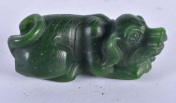 A CHINESE CARVED GREEN JADE TYPE ANIMAL 20th Century. 91.8 grams. 7 cm x 3 cm.