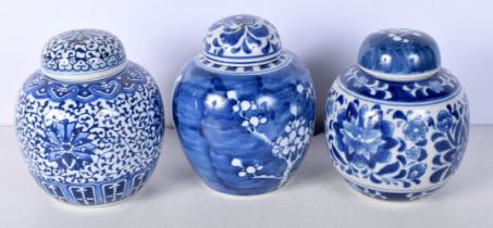 A collection of Chinese blue and white Ginger jars with covers 16 cm (3).