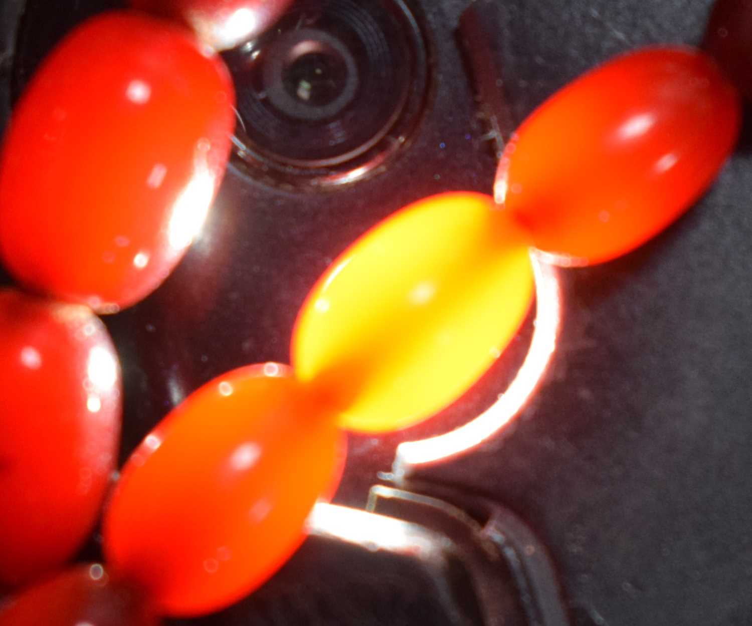A CHERRY AMBER NECKLACE. 54 grams. 76 cm long, largest bead 2.5 cm x 1.75 cm. - Image 5 of 6