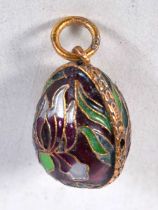 A Silver and Enamel Egg Pendant. Stamped 925, 2.2 cm x 1.5 cm, weight 6.3g