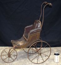 A small Victorian Childs leather upholstered Dolls pram 72 cm.