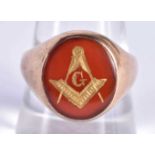 AN 18CT GOLD AND ENAMEL MASONIC RING. 6.3 grams. Q.