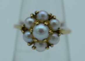 A 9CT GOLD AND PEARL RING. J. 2.3 grams.