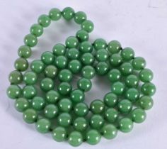 A CHINESE JADE NECKLACE. 164 grams. 87 cm long.