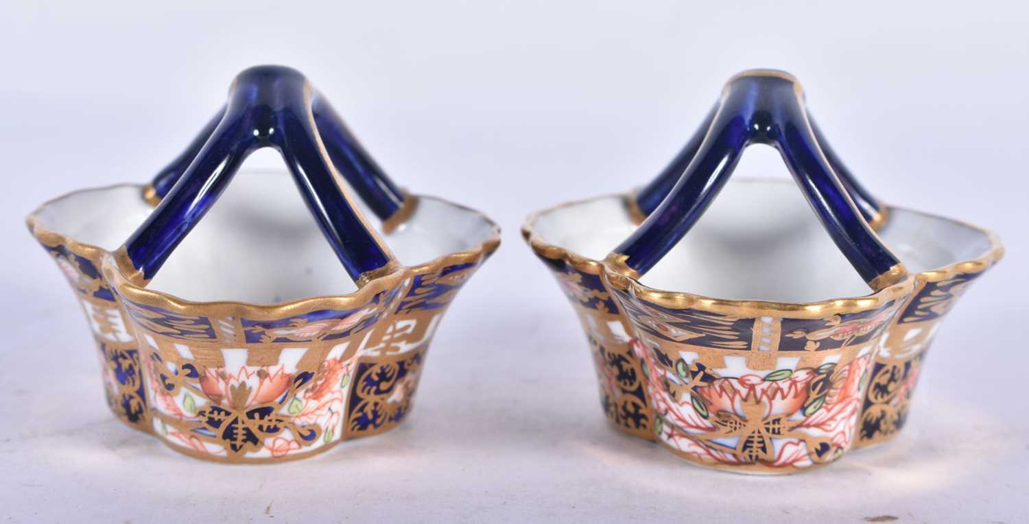 A PAIR OF MINIATURE ROYAL CROWN DERBY IMARI BASKETS. 7 cm wide. - Image 2 of 3