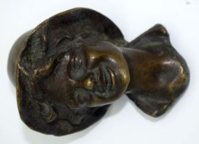 A small 19th Century bronze head of a young boy 11cm.