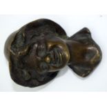 A small 19th Century bronze head of a young boy 11cm.