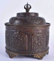 AN 18TH/19TH CENTURY TIBETAN REPOUSSE BUDDHIST BOX AND COVER decorated with scrolling foliage and