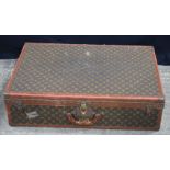 A Louis Vuitton suitcase 22 x 81 x 52 cm.