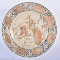 A 19TH CENTURY JAPANESE MEIJI PERIOD SATSUMA PLATE painted with immortals. 24 cm diameter.