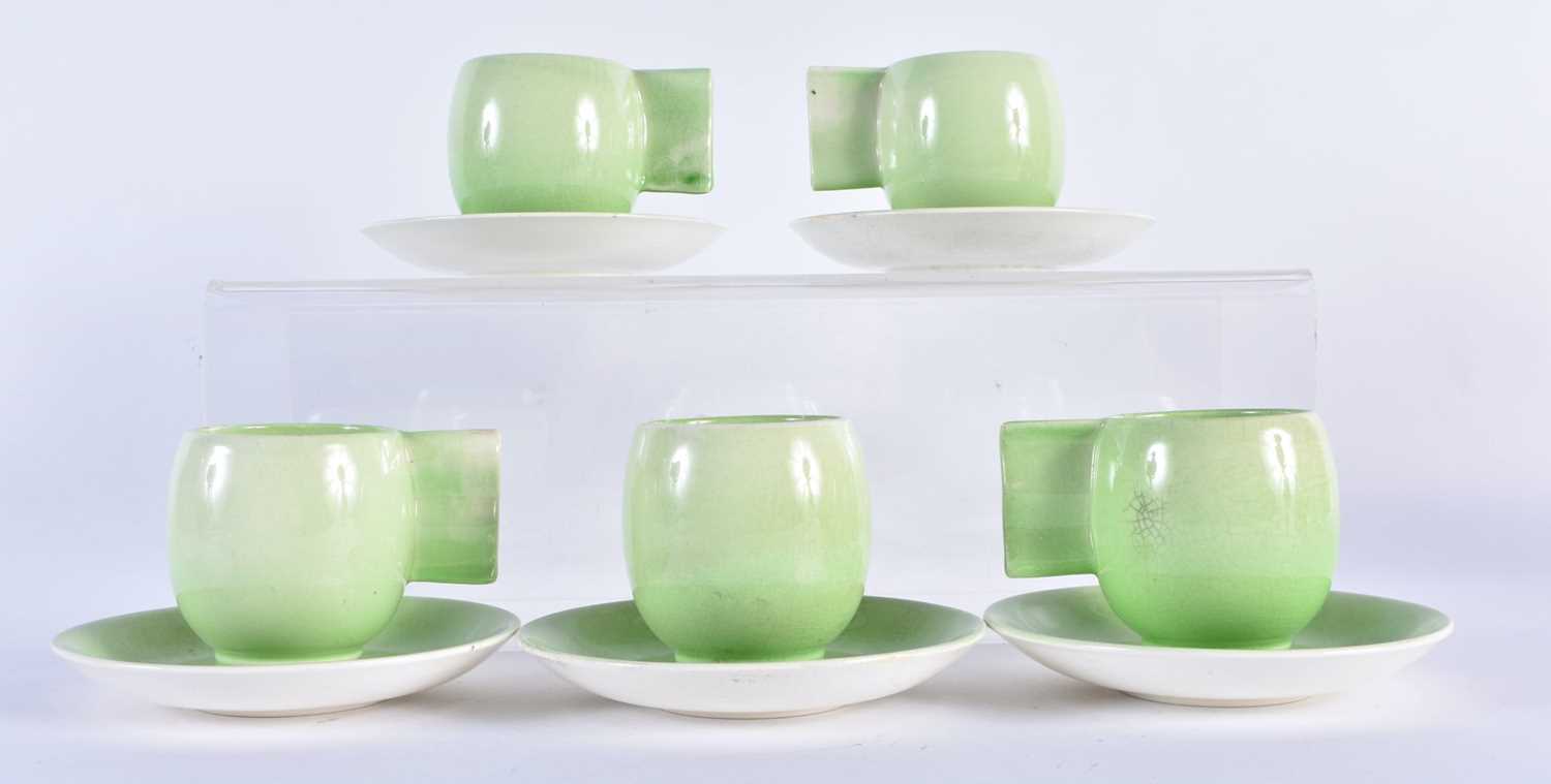 A SET OF FIVE APPLE GREEN CARLTON WARE CUPS AND SAUCERS. (10)