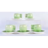 A SET OF FIVE APPLE GREEN CARLTON WARE CUPS AND SAUCERS. (10)