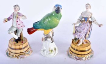 A MEISSEN PORCELAIN FIGURE OF A PARROT together with a pair of Continental figures. Largest 15 cm