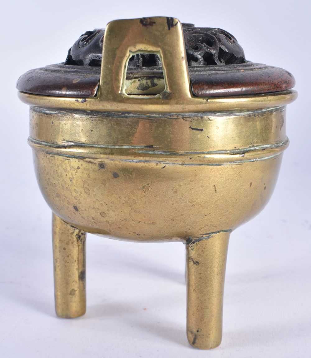 A 19TH CENTURY CHINESE TWIN HANDLED BRONZE QING CENSER, with hardwood cover. 11cm x 9 cm. - Image 2 of 14