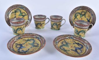 FOUR EARLY 20TH CENTURY CHINESE FAMILLE ROSE PORCELAIN DRAGON CUPS AND SAUCERS Late Qing/