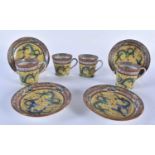 FOUR EARLY 20TH CENTURY CHINESE FAMILLE ROSE PORCELAIN DRAGON CUPS AND SAUCERS Late Qing/