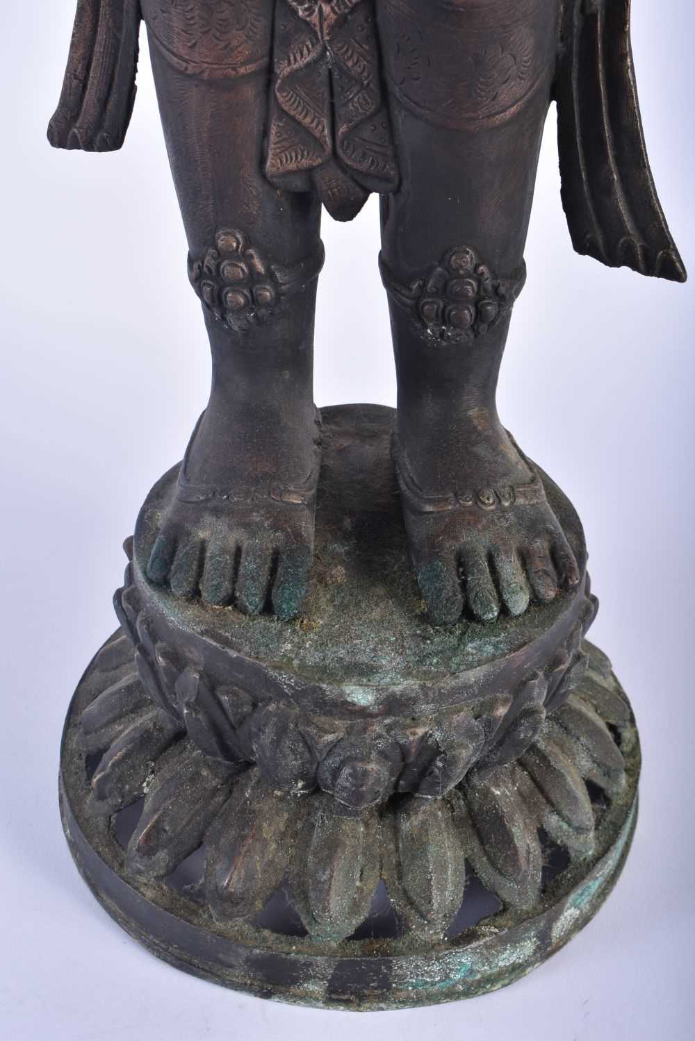A LARGE 19TH CENTURY INDIAN TIBETAN BRONZE FIGURE OF A STANDING DEITY modelled upon a leaf form - Image 5 of 8