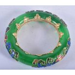 A Chinese Jade Bangle with Enamel Decoration. Internal diameter 5.6 cm, weight 107.8g