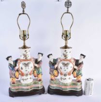 A PAIR OF CHINESE REPUBLICAN PERIOD HEHE ERXIAN TYPE FIGURAL PORCELAIN LAMPS. 46 cm x 18cm.