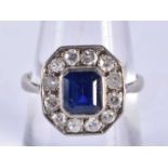 AN ART DECO 18CT GOLD DIAMOND AND SAPPHIRE RING. N. 3.1 grams.