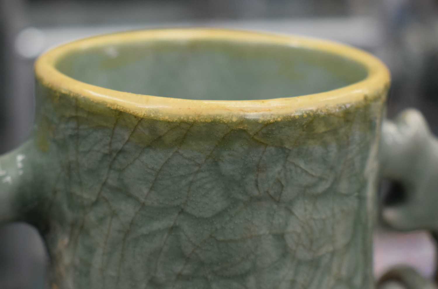 A LARGE 18TH/19TH CENTURY CHINESE TWIN HANDLED CELADON VASE decorated with foliage and vines. 54 - Image 6 of 12
