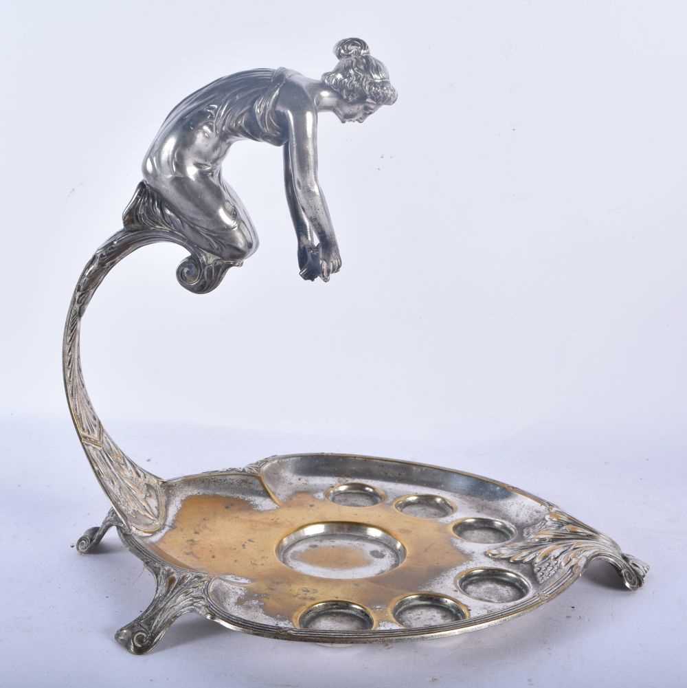 AN UNUSUAL WMF SILVER PLATED DECANTER AND GLASS STAND formed with a leaning female. 24 cm x 18cm. - Image 4 of 8