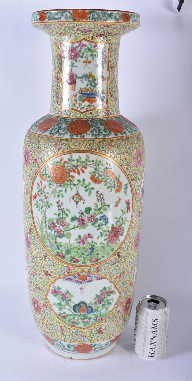 A VERY LARGE 19TH CENTURY CHINESE FAMILLE ROSE STRAITS PORCELAIN ROULEAU VASE Qing, painted with