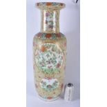 A VERY LARGE 19TH CENTURY CHINESE FAMILLE ROSE STRAITS PORCELAIN ROULEAU VASE Qing, painted with