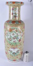 A VERY LARGE 19TH CENTURY CHINESE FAMILLE ROSE STRAITS PORCELAIN ROULEAU VASE Qing, painted with