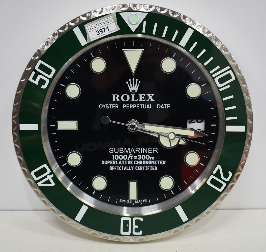 A Contemporary Rolex style dealership clock 33 cm.