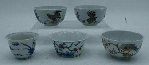 A collection of Chinese porcelain tea bowls largest 4 x 8 cm (5)