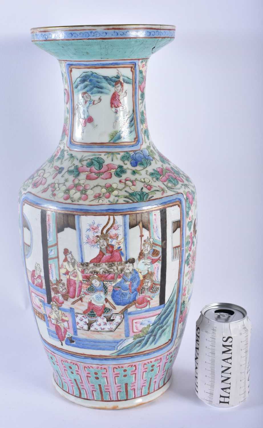 A LARGE 19TH CENTURY CHINESE FAMILLE ROSE PORCELAIN VASE Qing, painted with figures within