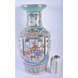 A LARGE 19TH CENTURY CHINESE FAMILLE ROSE PORCELAIN VASE Qing, painted with figures within