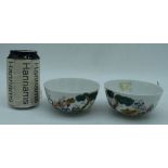 A pair of Chinese porcelain polychrome bowls decorated with figures and bats 6 x 10.5 cm (2).
