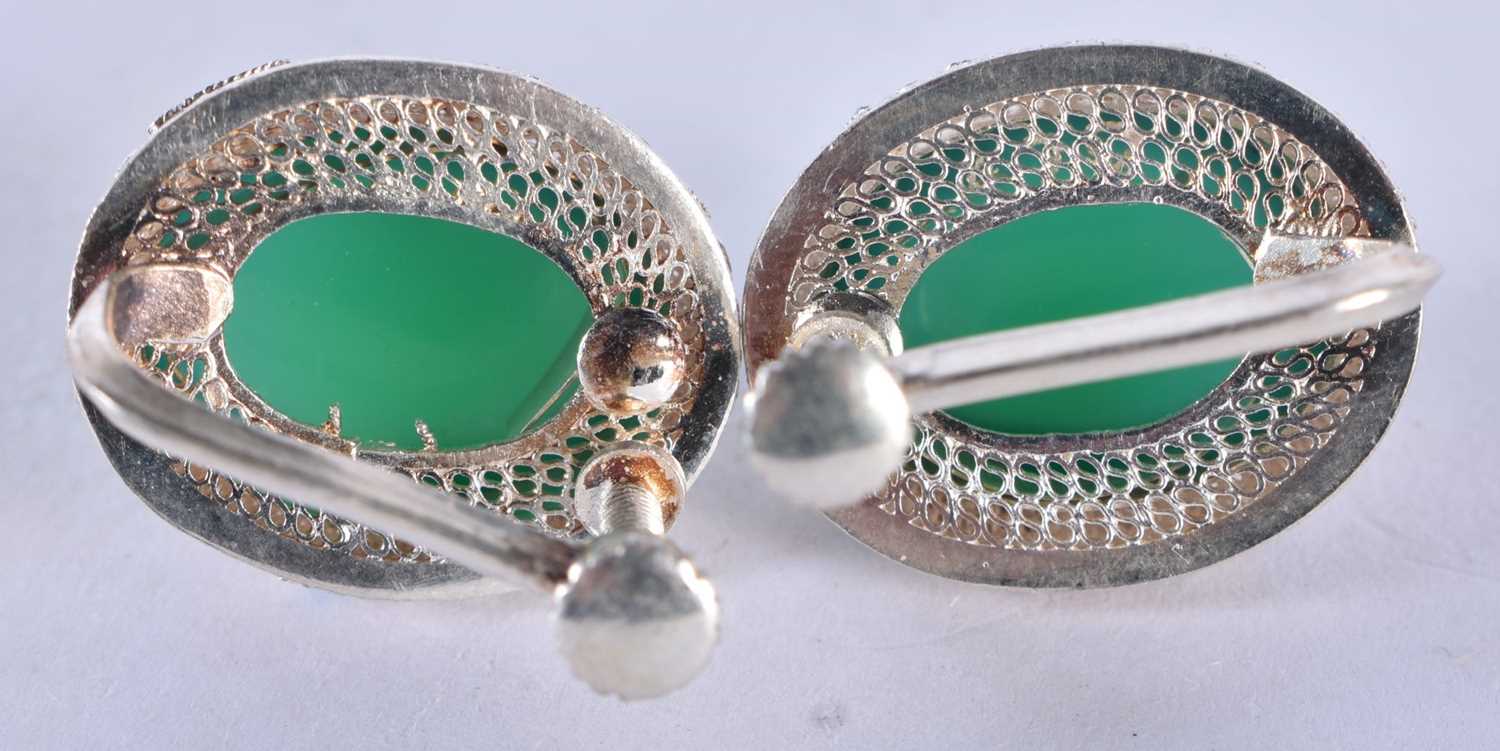 A Pair of White Metal and Enamel Earrings set with Jade Cabochons. 1.9cm x 1.6 cm, weight 9.7g - Image 2 of 3