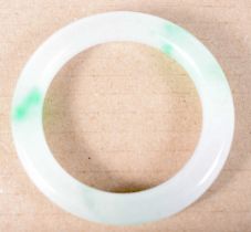 A Jade Bangle. 5 cm internal diameter, weight 48.3g