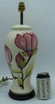 A large Moorcroft Magnolia flowers lamp base 45cm.