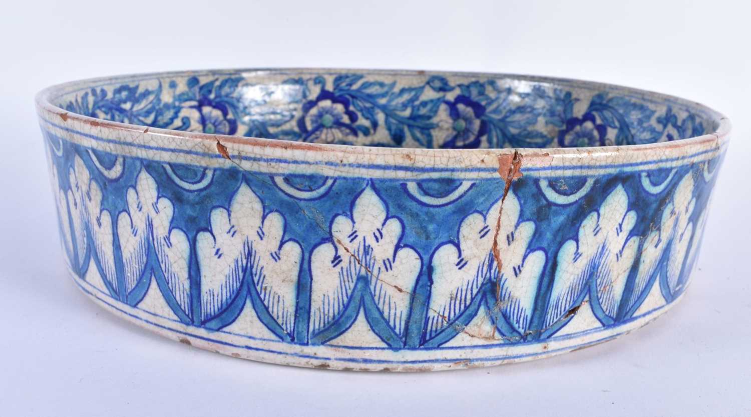 A RARE LARGE 19TH CENTURY MIDDLE EASTERN ISLAMIC IZNIK TYPE POTTERY BASIN painted with panels of - Image 4 of 5