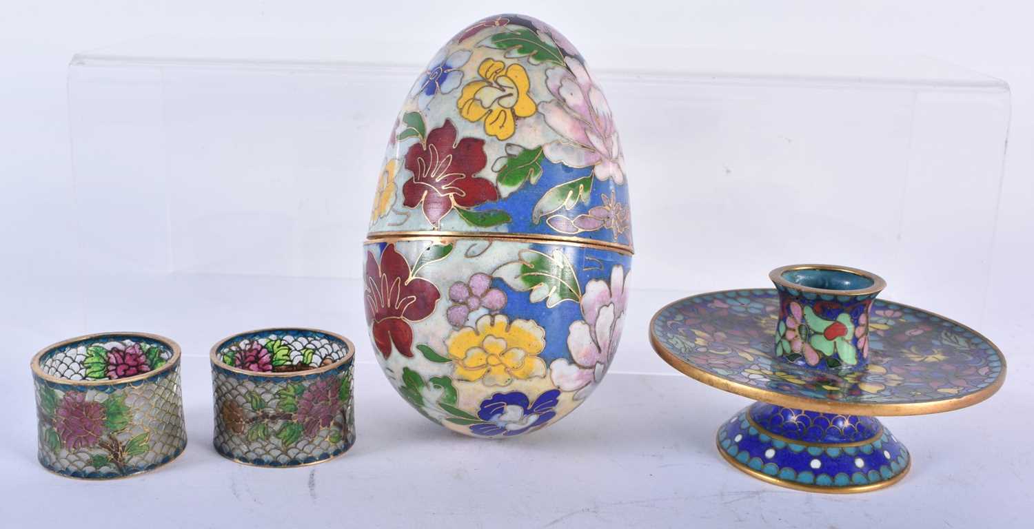 A PAIR OF LATE 19TH CENTURY CHINESE PLIQUE A JOUR NAPKIN RINGS together with an egg box & candle