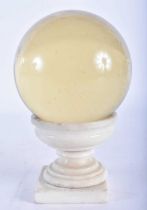 A 19TH CENTURY GRAND TOUR CARVED PEDESTAL MARBLE STAND holding aloft a period crystal glass bowl. 15