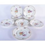 A SET OF TEN DANISH ROYAL COPENHAGEN PORCELAIN SCALLOPED DISHES painted with flowers. 21 cm wide. (