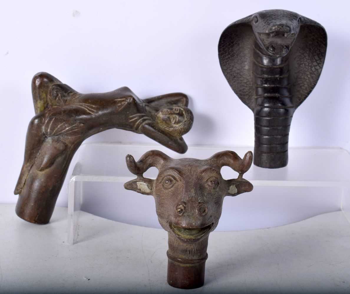 A collection of bronze walking cane handles 11 x 9.5 cm (3),. - Bild 2 aus 8