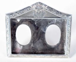 A Silver Double Picture Frame. Stamped Sterling, 6.5 cm x 7.1cm, weight of silver 32.4g
