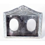 A Silver Double Picture Frame. Stamped Sterling, 6.5 cm x 7.1cm, weight of silver 32.4g