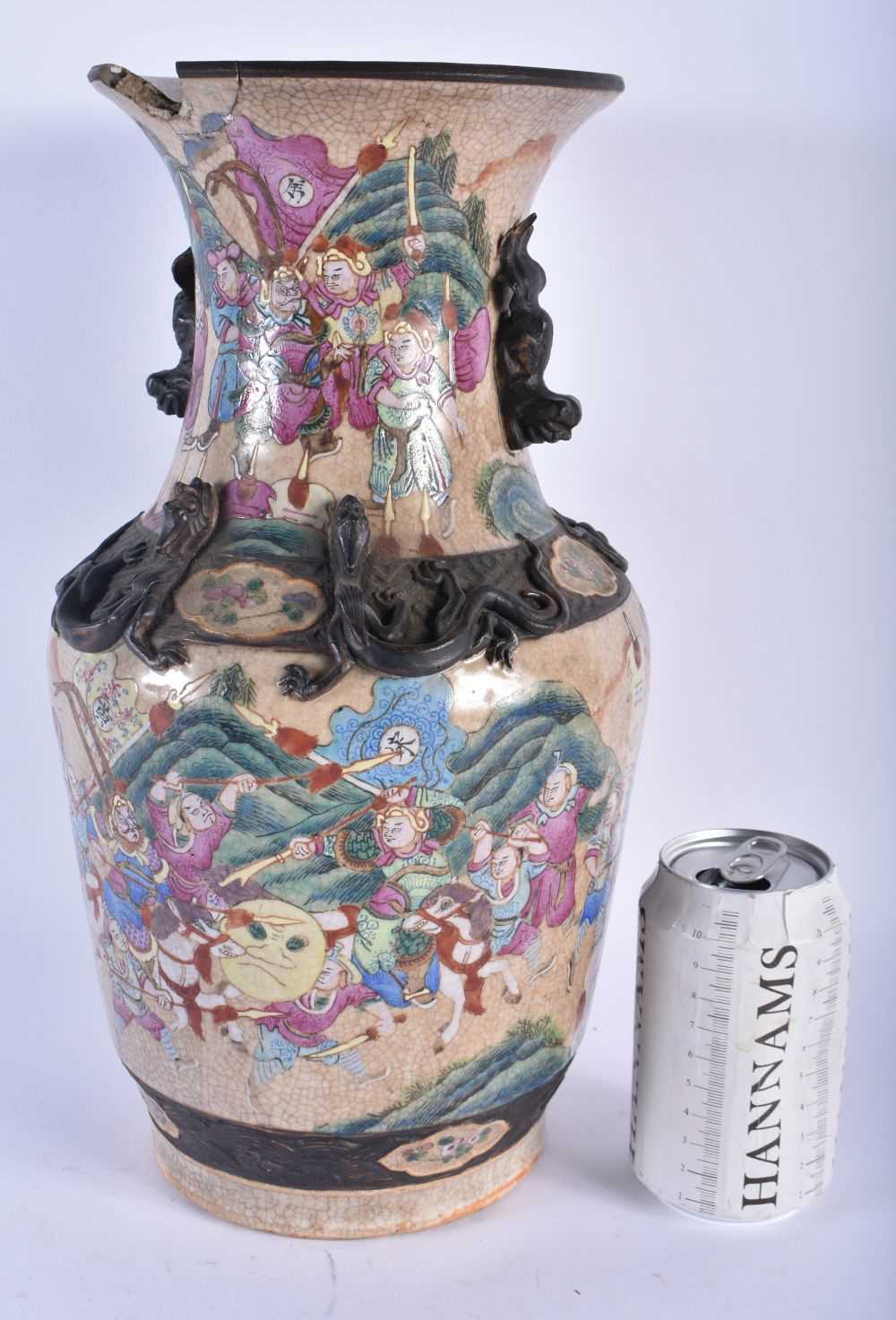 A 19TH CENTURY CHINESE CRACKLE GLAZED PORCELAIN VASE Qing, painted with warriors in a landscape.