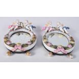 A pair of small Meissen porcelain mirrors 18.5 x 12 cm