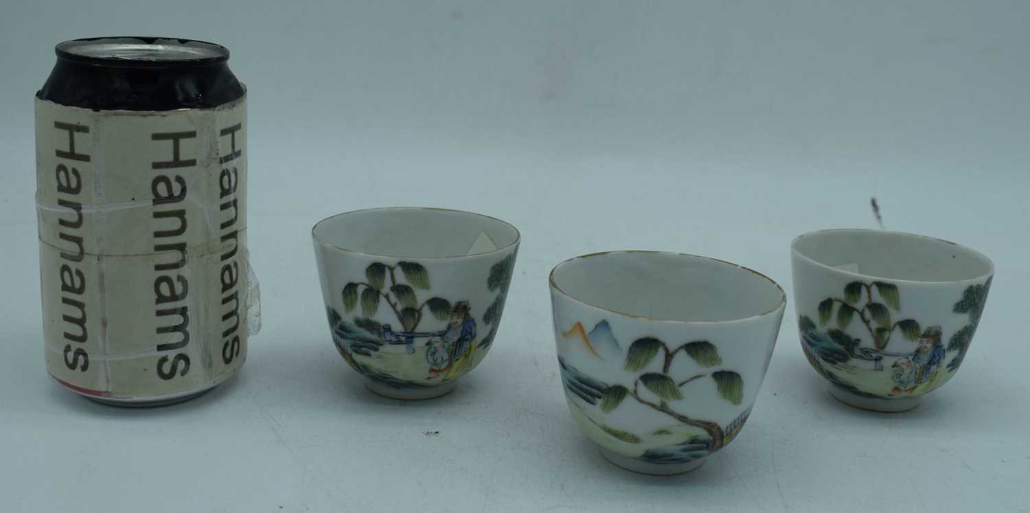 Three Chinese porcelain tea bowls decorated with figures in a landscape 6 x 7 cm (3) - Image 2 of 6
